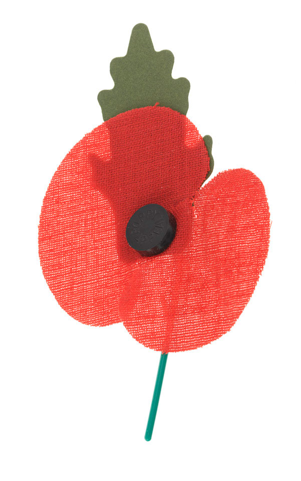 A red poppy made of thin cotton fabric